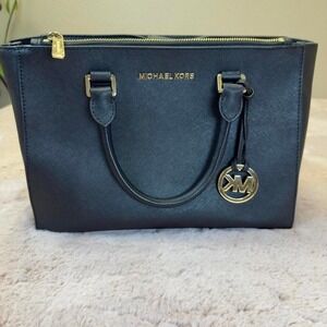 black Michael Kors leather satchel with gold-tone hardware/detachable strap